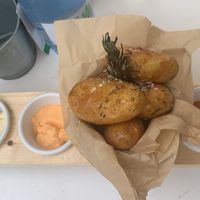 Roast potatoes with three types of vegan dip at MariCastaña in Almeria