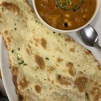 Garlic naan and mixed vegetable curry at Raja in Naha