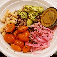 purple rice blend, chickpeas, grape tomatoes, pickled red onion, avocado, black sesame seeds, balsamic dressing at CoreLife Eatery in Springfield