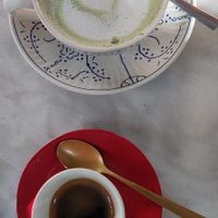 Matcha latte and coffee at L'Alchimiste in Brussels