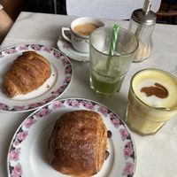 Coffee, golden Latte, croissant, pain au chocolate  at L'Alchimiste in Brussels