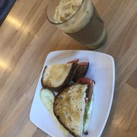 Tofu lettuce and tomato and an iced chai  at The Hostel Cafe in Portland