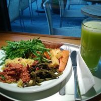 full sampling of buffet food for late lunch and a green juice to enjoy with it at Tibits in London