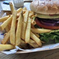 The Squeeze Burger with “Isn’t Bacon” and Violife “cheese"  at The Blue Bell in Conwy
