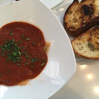 Spinach artichoke ravioli with garlic bread at Ananda Fuara in San Francisco
