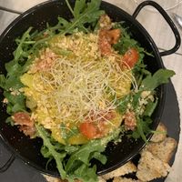 Timbal de patatas al horno con no queso de cabra y cebolla caramelizada  at La JunGla in Valencia