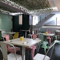 The main area showing the stairs up to the upper level    at La JunGla in Valencia