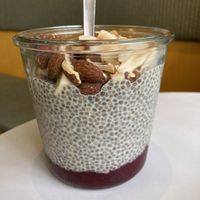 Seasonal „red berry“ chia pudding (peanut butter hidden inside 😍)  at GRØD in Aarhus
