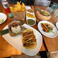 Guacamole, trio of dips, empanadas, butternut squash taco with rice and black beans   at Corto Lima in Lexington