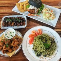 Black magic burger, basil pesto spaghetti, popcorn mushrooms & panggang tempeh 🙌🏼 at Blue in Penang