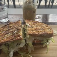 Souvlaki toastie and iced coffee with ice cream   at Love Madre in Cheltenham