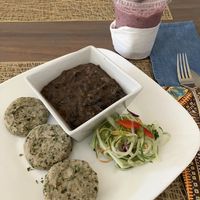 black bean stew, dumplings and berry seamoss smoothie  at Living Food and Juices in Kingston