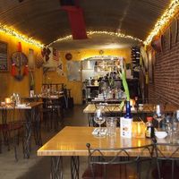 Toilet downstairs and one more table in the window at Wau Restaurant in Amsterdam