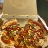 GF Vegan pizza (cashew cheese and sausage) added peppers.  at Amore Mio in Oranjestad