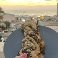 Delicious, flaky, and flavorful bread woven with spinach, mushroom, and cashew cheese... WOW at Vivida in Tel Aviv