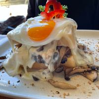 Mushroom francesinha with egg (Vegetarian) at Tudo aos Molhos in Sao Joao Da Madeira
