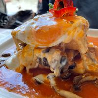 Mushroom francesinha with egg and sauce (Vegetarian) at Tudo aos Molhos in Sao Joao Da Madeira