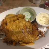 Half eaten Banana Blossom Fish and Chips. Comes with Mushy Peas at The Pullman in Folkestone