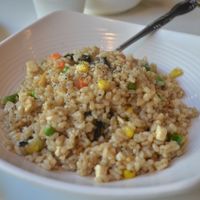 Royal Fried Rice (GFO):
Fried *brown rice w/ tofu, soy protein, *vegetables, seaweed, & pine nuts. at Golden Era Vegan Restaurant in San Francisco