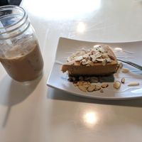 pumpkin almond cheesecake and iced coffee! at Golden Era Vegan Restaurant in San Francisco