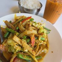 Curry oyster mushroom, white rice and thai iced tea. at Golden Era Vegan Restaurant in San Francisco