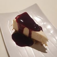 Cheesecake with blueberry sauce at Golden Era Vegan Restaurant in San Francisco