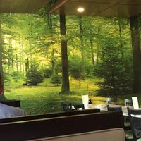 Nice mural adds to the ambiance  at Golden Era Vegan Restaurant in San Francisco