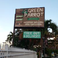 Sign outside the restaurant at The Green Parrot in Nassau