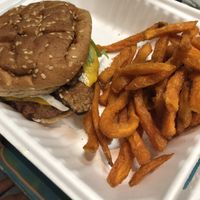 Burger with blue cheese and sweet potato fries  at Juice Merchants of Media in Media