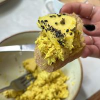 Toast with scrambled tofu and avocado   at Alimentos da Vila in Salvador