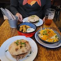 Front no cheese burger, dirty fries, onion rings and beet patty rear at Szabad Bisztro in Budapest