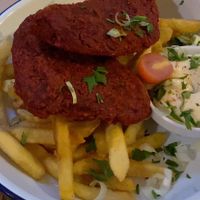 Beetroot patty and fries  at Szabad Bisztro in Budapest