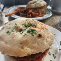 Balkan Burger, Pulled “Pork” sandwich, and carrot fries at Szabad Bisztro in Budapest