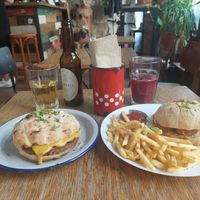 "Cheese" burger and "Chicken" burger, with cider and home made juice at Szabad Bisztro in Budapest