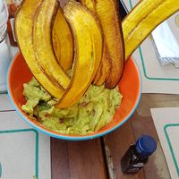 Chips de banana com guacamole at Banana Verde in Sao Paulo