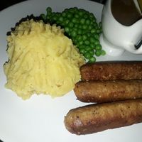 Vegan sausages and mash with peas and vegan gravy at Archers in Chiang Mai