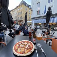 Added onion to the sausage pizza, local beer, nice buildings to look at.  at The Tube Bar in Luxembourg City