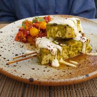 Mesquite Grilled Tofu Skewers with pomegranate tomato salad at Greens Restaurant in San Francisco