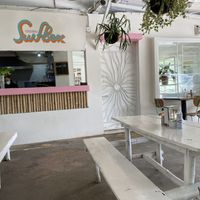 Outdoor seating at Surf Box in Playa Flamingo