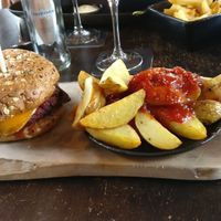 Vegan burger met patatas bravad at Volt in Geel