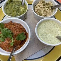 Vier vegane Dips: Green Zhoug, Hummus, Muhammara, Joghurt-Zitrone  at Kate's Joint in Copenhagen