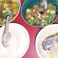Left: tofu with vegetables and rice. Right: aubergine, peanut and spring onion with brown rice at Kate's Joint in Copenhagen