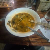 This is my food after I had finished. You can see to the right hand side some of the potatoes I've taken out and they're raw. at Kapphet Vegan in Vang Vieng