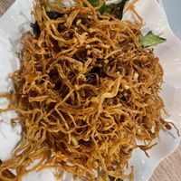 the crispy mushroom noodles.  I thought it would be noodles with mushrooms. It was not and was a little oily   at Kapphet Vegan in Vang Vieng