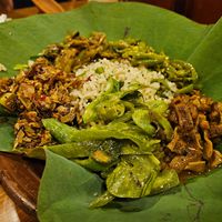 Garlic rice, mushrooms, snake gourd, green beans, banana leaf and aubergine at Ranbath in Colombo