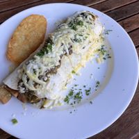 Breakfast burrito with tofu + hash brown   at The Lillipad Cafe in Cairns