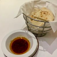 Complimentary pita bread with sun dried tomato dipping oil at Pasha Grill in Dayton