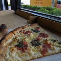 Vegan slices with vegan mozzarella + pesto at Uncle Tony's Pizza in New York City