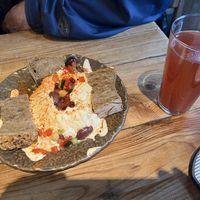 Hummus, sourdough bread with strawberry ginger lemonade   at Honest Greens - Plaça Catalunya in Barcelona