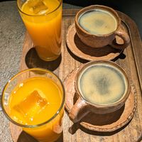 Orange juice and coffee at Honest Greens - Plaça Catalunya in Barcelona